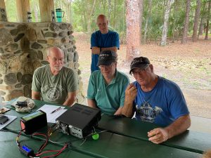 Icom 7300 Operating Position. Front: Rob WD4IFT, Dee W4DCH &amp; Dean N0OAC, Rear: Unknown