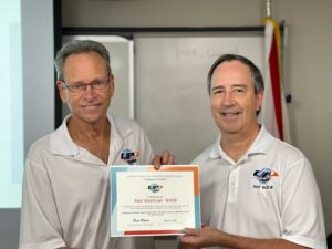 Alan W4UB receiving the President's Award from UPARC President Fred Botero W2SUB.