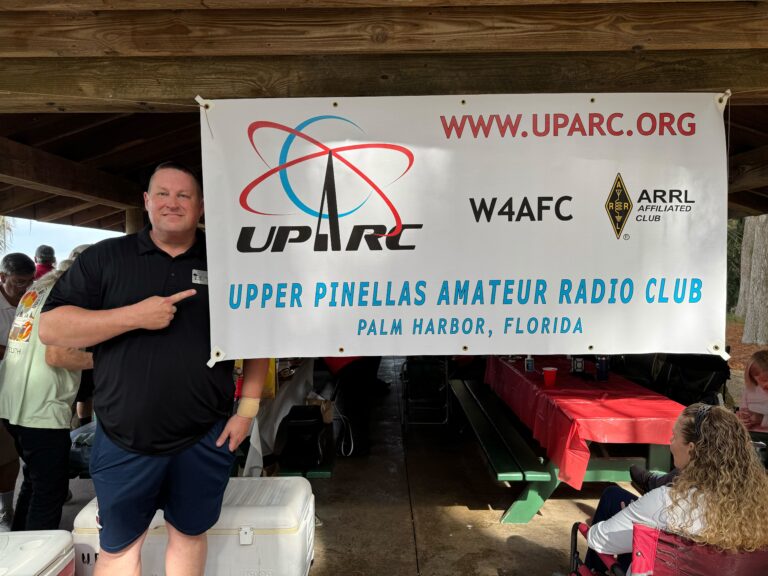 Ryan AF4O standing next to the new UPARC club banner